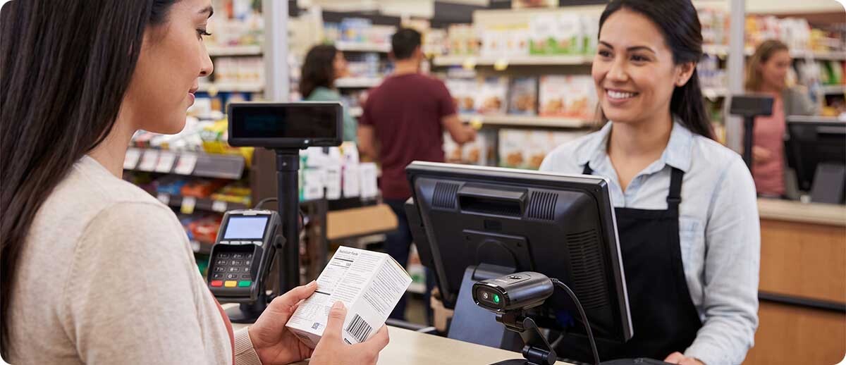 Fixed Mount Scanners vs. Handheld: When Automating a Scan Point Makes More Financial Sense Fixed Mount Scanners vs. Handheld: When Automating a Scan Point Makes More Financial Sense